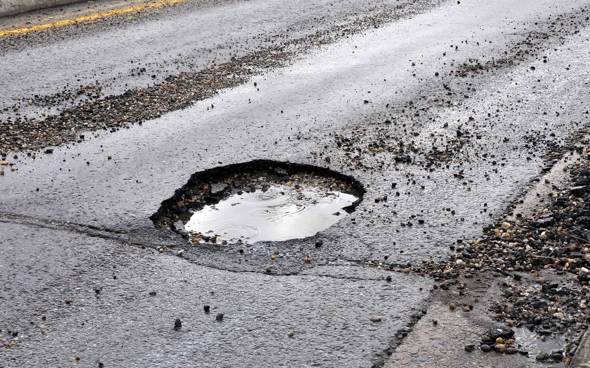 How Snow And Ice Cause Long Term Commercial Asphalt Maintenance Issues